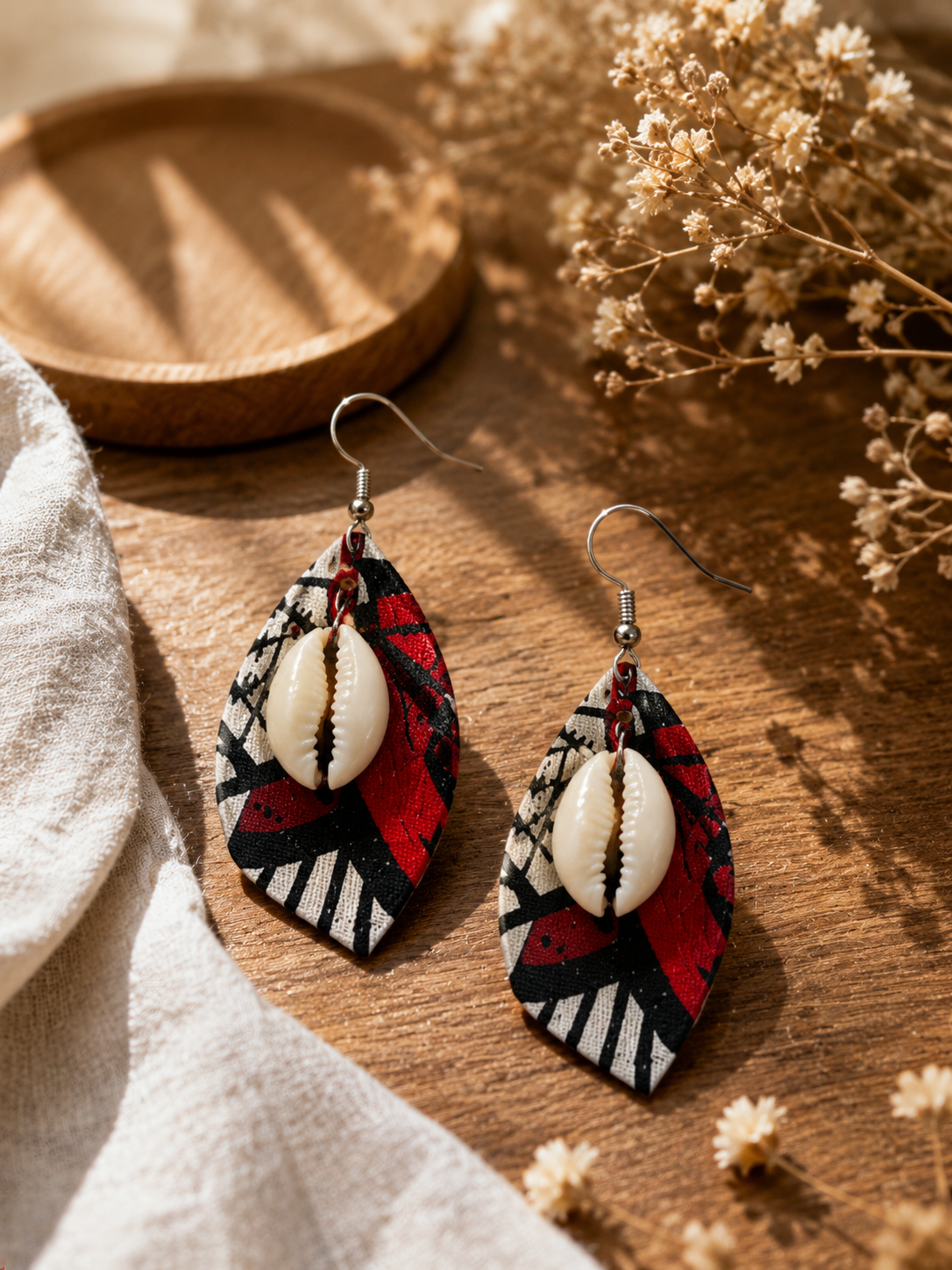 Boucle d’oreilles artisanales en tissu Wax et cauri